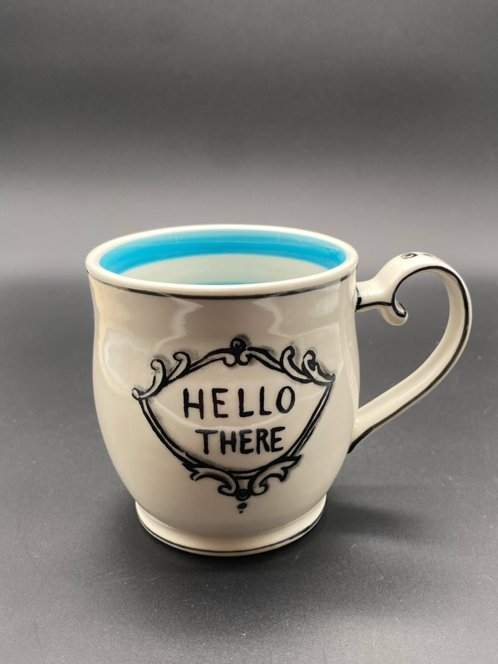 Molly Hatch Anthropology Ceramic Mug with Blue Striped Interior. “Hello There”.